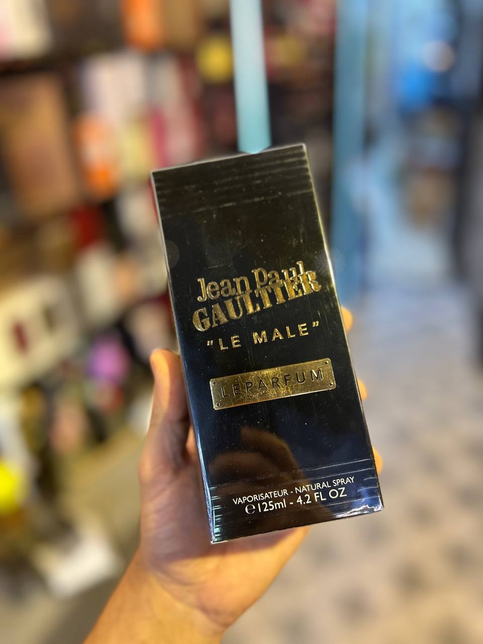 a person holding up a box of harry potter gauffle